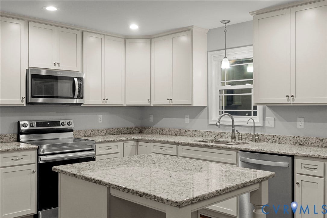 2953 Preston Park Court, Western Goochland County, Goochland, VA 23153 Kitchen featuring perimeter and island countertops with a light granite finish, white shaker-style cabinetry, stainless steel appliances, and recessed lighting