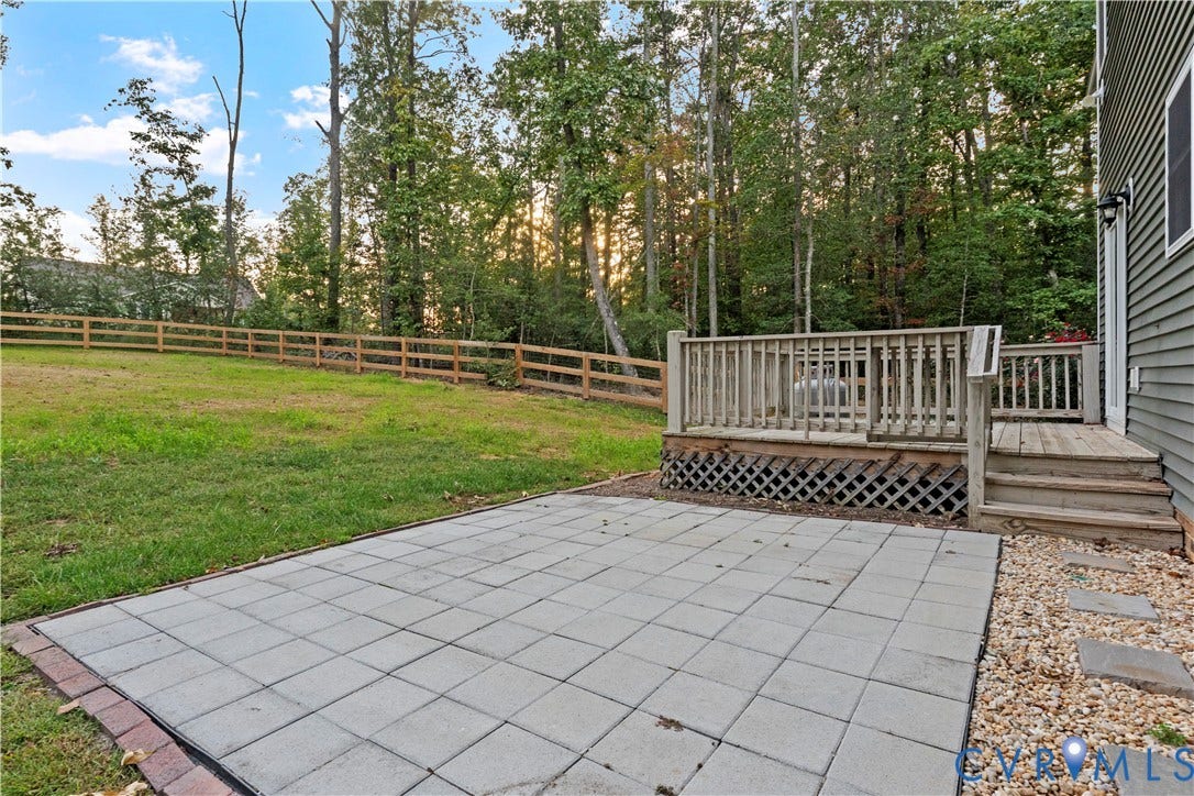 2953 Preston Park Court, Western Goochland County, Goochland, VA 23153 Two-story home featuring horizontal siding exterior, composite deck with lattice detailing, and a concrete patio