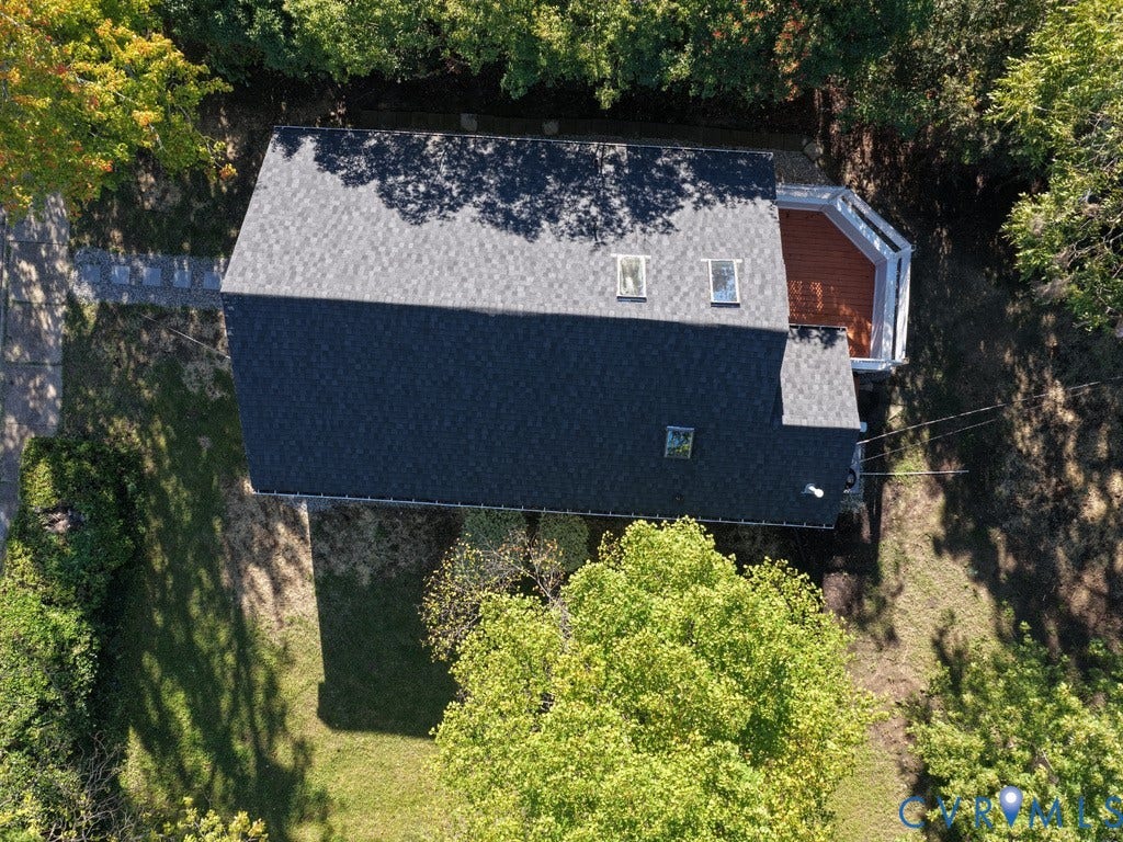 2201 Richmond Street, Hopewell, VA 23860 Gable roof with asphalt shingles, dormer windows, and an outdoor deck with white railings