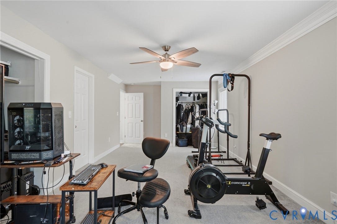 6624 Miller Road, Henrico, VA 23231 You truly have room for a bed, hime office, and home gym in this space if you choose to. There are two closets for storage and clothes. Access to thee primary bathroom is behind the closed door.