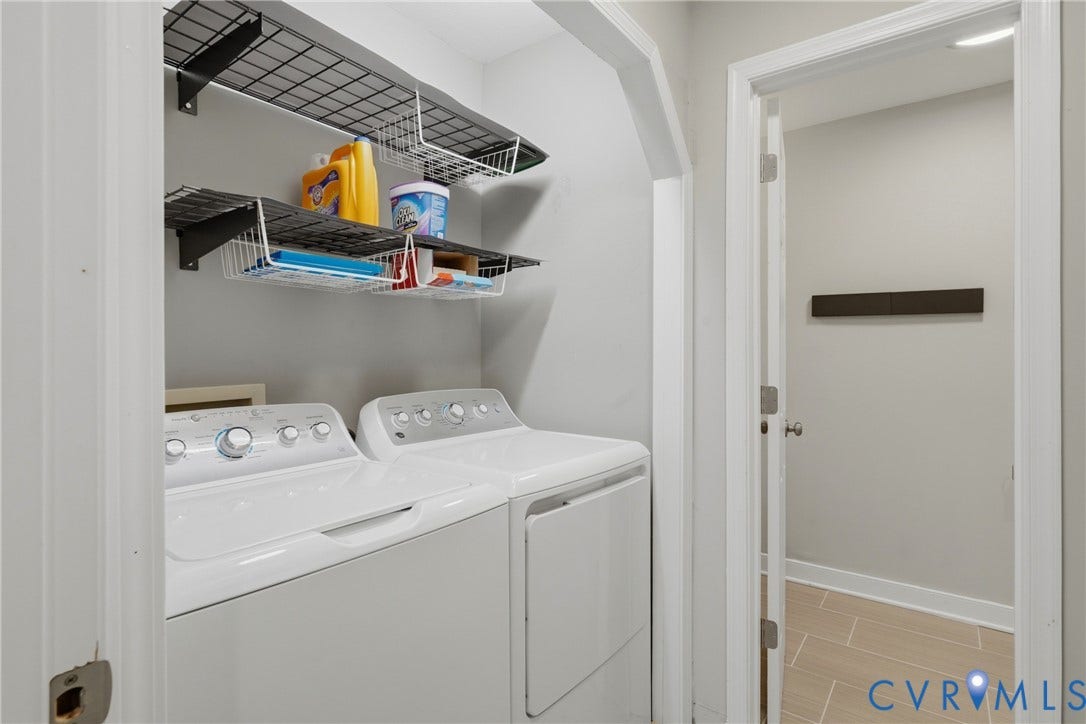 6624 Miller Road, Henrico, VA 23231 Laundry area featuring wall-mounted wire shelving and a tiled floor