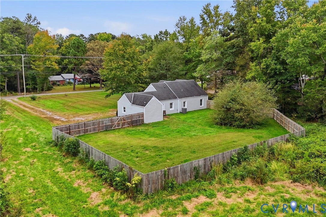 6624 Miller Road, Henrico, VA 23231 Charming rural residence set on expansive grounds featuring mature landscaping and established trees