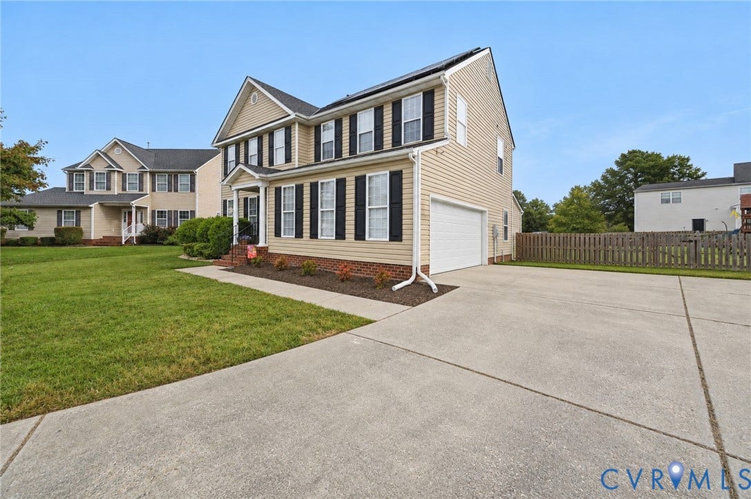 3912 Houze Terrace, Spring Lake, Henrico, VA 23060 Two-story home featuring siding exterior, an attached garage, a concrete driveway, and a front yard with mature landscaping