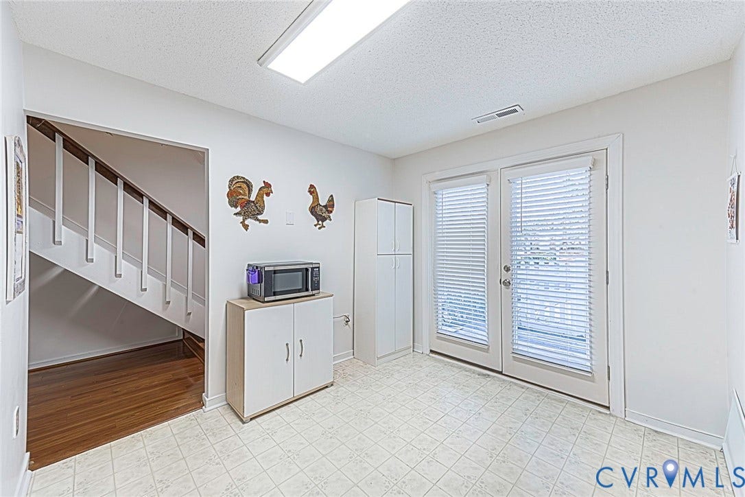 Roomy eat in kitchen with easy access to front deck. Enjoy your morning coffee outside.