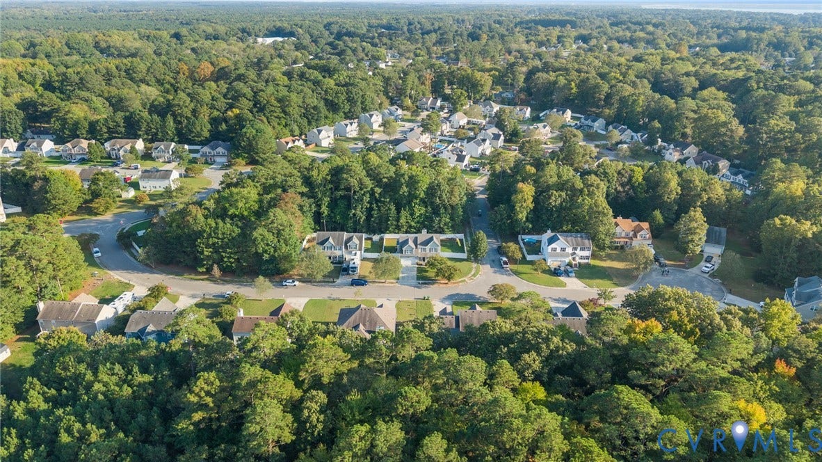 6852 Watch Harbour Circle, Hayes, VA 23072 Residential neighborhood with mature trees and a curvilinear street layout