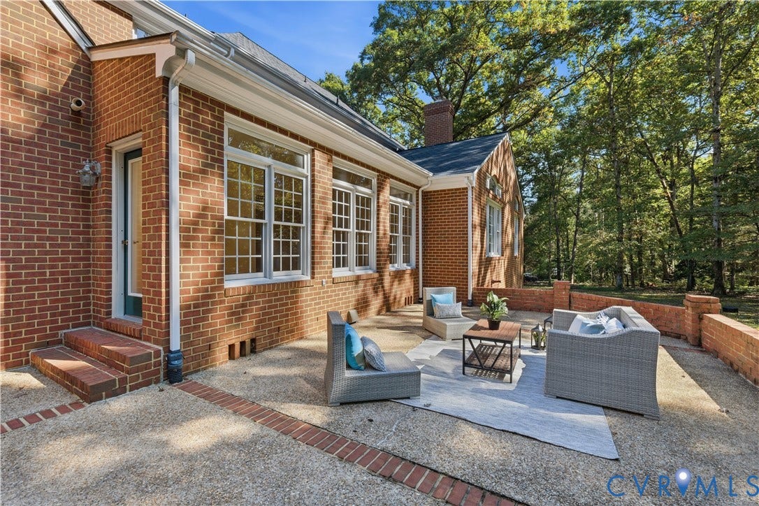 2611 Glenalmond Court, Powhatan, VA 23139 Aggregate patio overlooking the tree-lined rear yard.