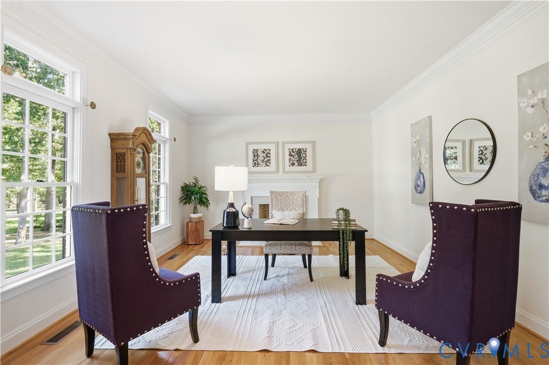 2611 Glenalmond Court, Powhatan, VA 23139 Formal living room/dedicated study with fireplace and transom windows.