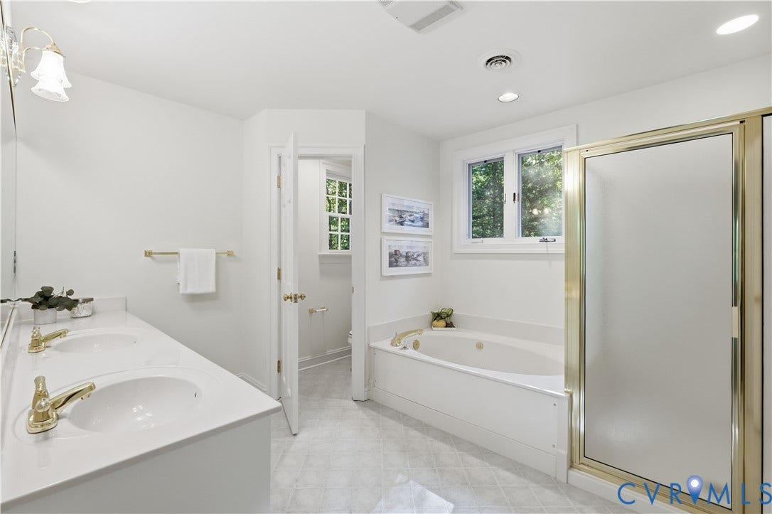 2611 Glenalmond Court, Powhatan, VA 23139 2nd floor primary upstairs with double sinks, tub, shower and water closet.