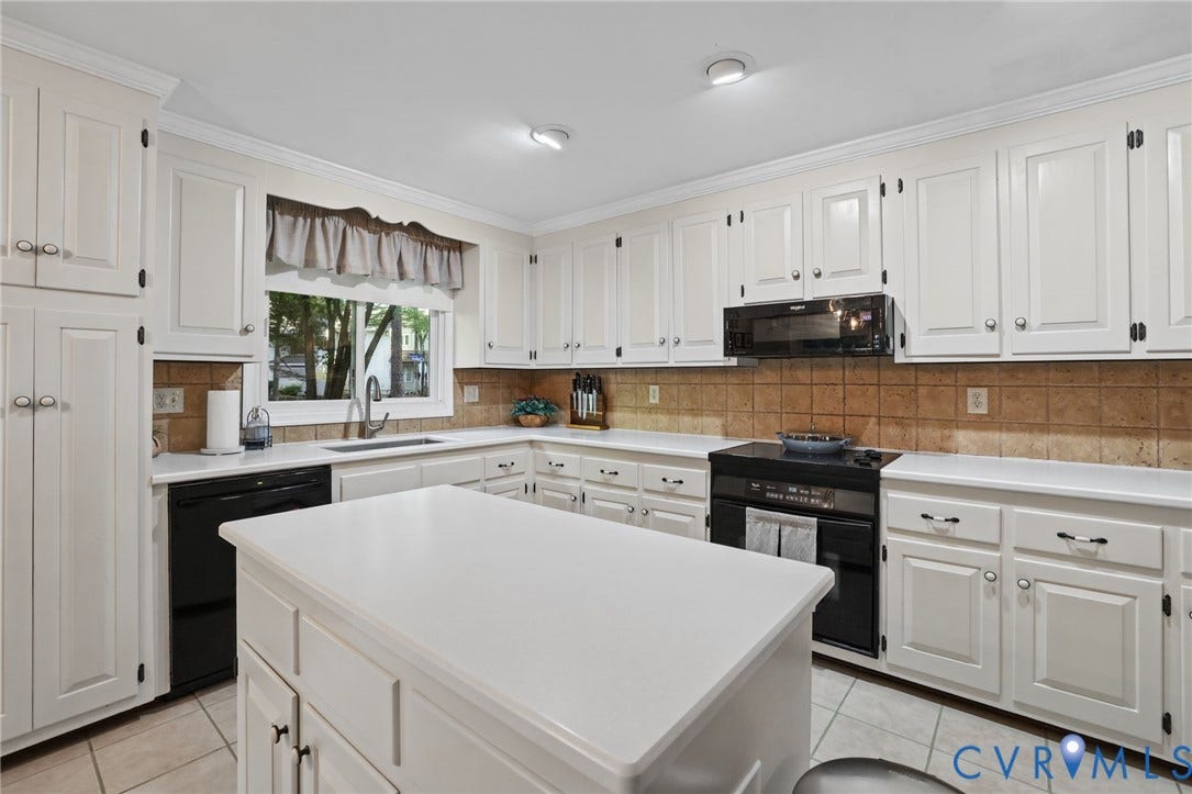 4815 Woodbriar Court, Midlothian, VA 23112 Kitchen featuring white cabinetry, center island with stone countertop, tile backsplash, recessed lighting, and tile flooring