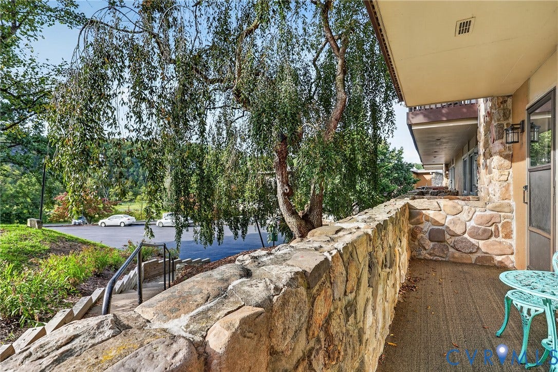 1836 FAIRWAY Drive, #218, Aspen East, Basye, VA 22810 Stone wall exterior with an integrated outdoor living area