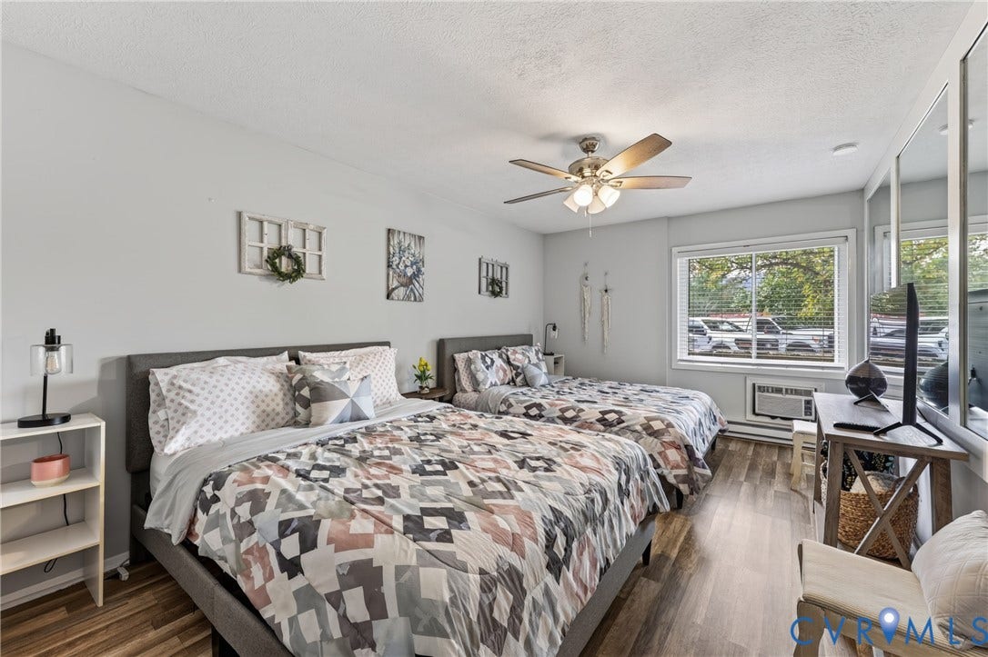 1836 FAIRWAY Drive, #218, Aspen East, Basye, VA 22810 Wood-finish flooring, ceiling fan, and large window with blinds