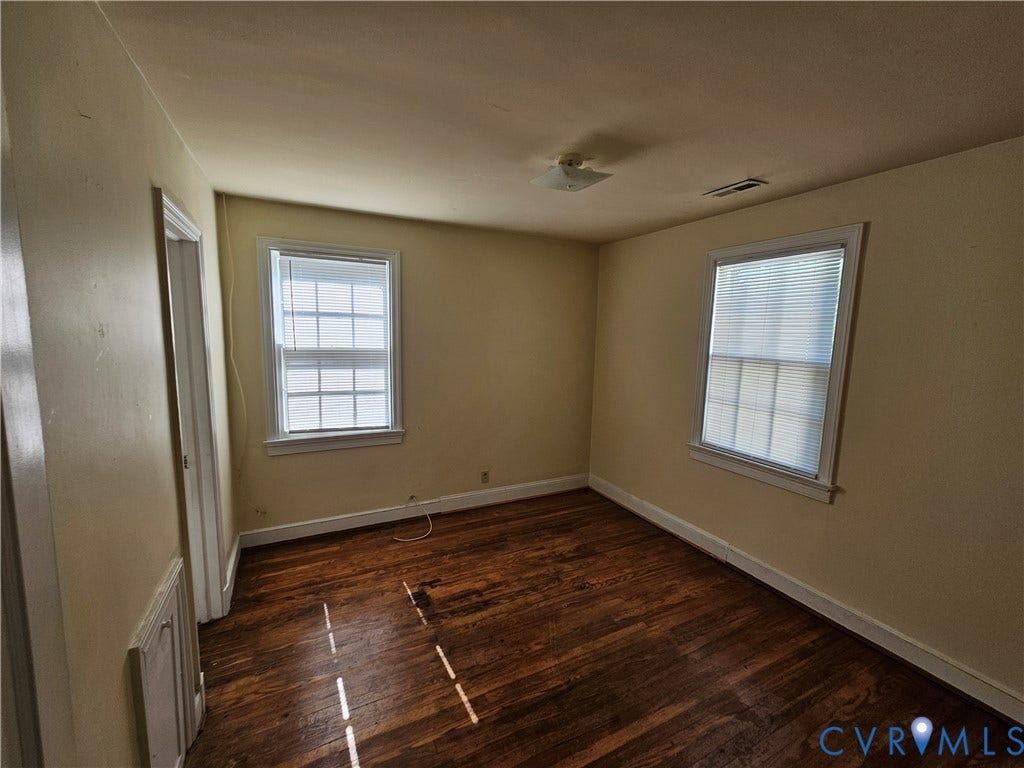 3814 Thimble Lane, Henrico, VA 23222 Hardwood flooring, two windows with blinds, and ceiling-mounted lighting