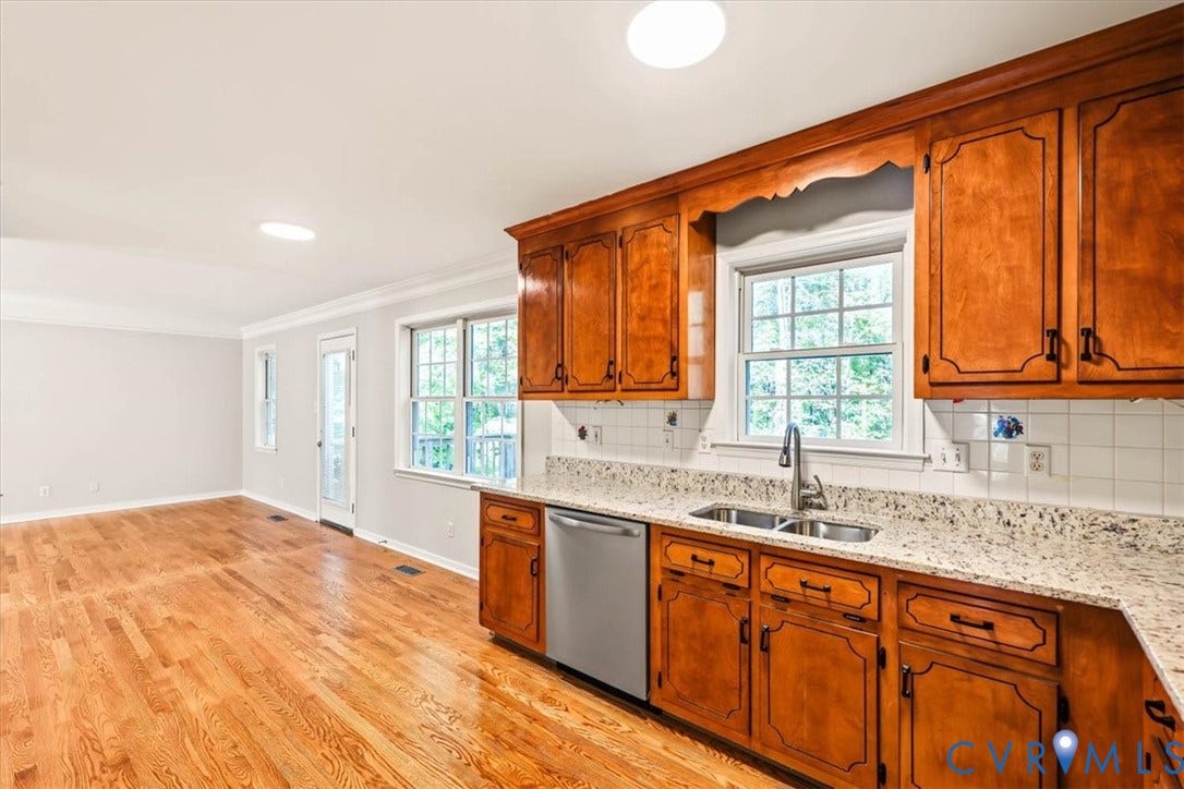 3216 Sherwood Bluff Terrace, Sherwood Bluff, Powhatan, VA 23139 Kitchen featuring wood cabinetry, stone-finish countertops, stainless steel dishwasher, double-basin sink with a high-arch faucet, and wood-finish flooring