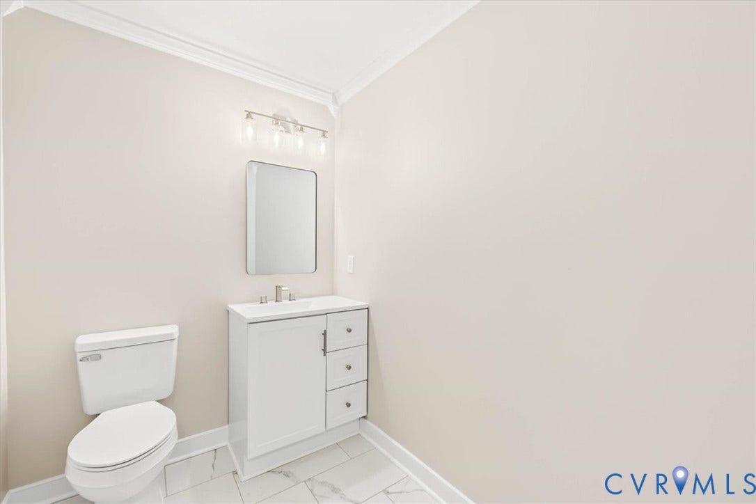 3216 Sherwood Bluff Terrace, Sherwood Bluff, Powhatan, VA 23139 White vanity with integrated basin and cabinet storage, rectangular wall-mounted mirror, multi-bulb vanity light, and stone-finish tile flooring