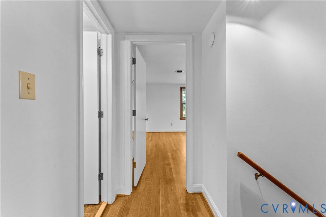 11612 Yorkdale Drive, Rivers Edge, North Prince George, VA 23860 Hardwood flooring, painted interior doors, white trim, and a wood handrail
