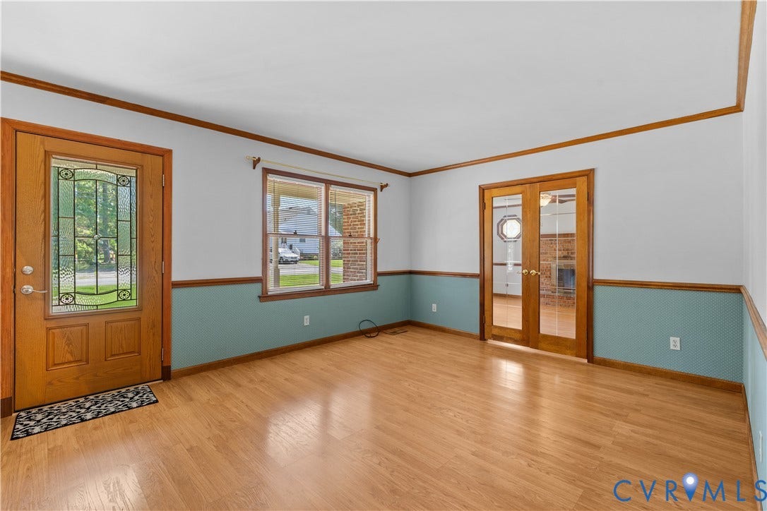 11612 Yorkdale Drive, Rivers Edge, North Prince George, VA 23860 Wood-finish flooring throughout, paired with a decorative paneled entry door