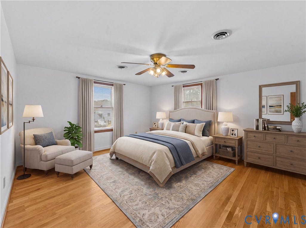 11612 Yorkdale Drive, Rivers Edge, North Prince George, VA 23860 Hardwood flooring, two windows with drapery, ceiling fan with integrated lighting, built-in shelving, and white walls
