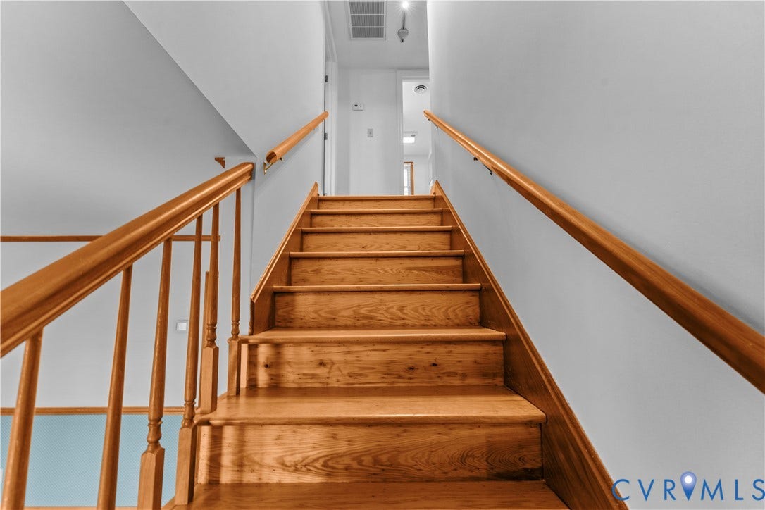 11612 Yorkdale Drive, Rivers Edge, North Prince George, VA 23860 Wood-finish staircase featuring balustrade and handrails