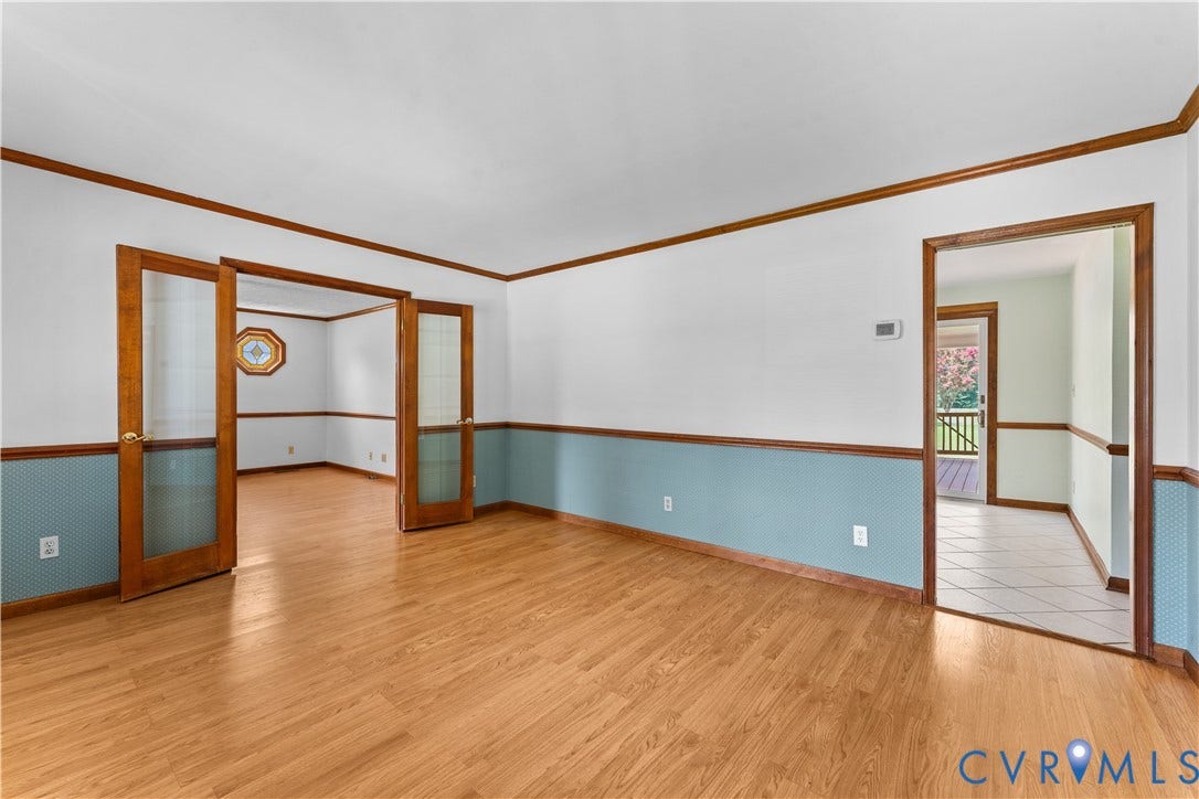 11612 Yorkdale Drive, Rivers Edge, North Prince George, VA 23860 Wood-finish flooring, half-wall wainscoting, solid wood French doors with frosted glass panels, and crown molding