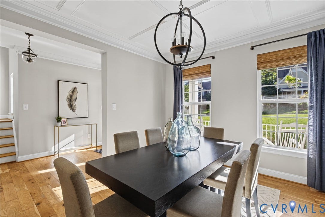 1425 Montcroft Way, Midlothian, VA 23112 Dining room featuring wood-finish flooring, coffered ceiling detail, and a prominent spherical chandelier