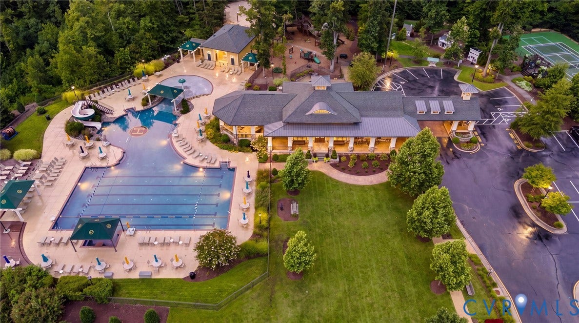 1425 Montcroft Way, Midlothian, VA 23112 Community clubhouse featuring a multi-lane swimming pool, water slide, tennis court, and dedicated parking area