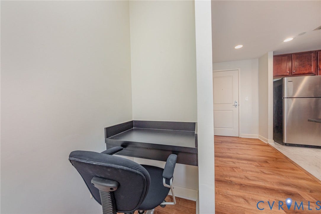 1101 Haxall Point, #709, Richmond, VA 23219 Built-in desk area with a dark finish