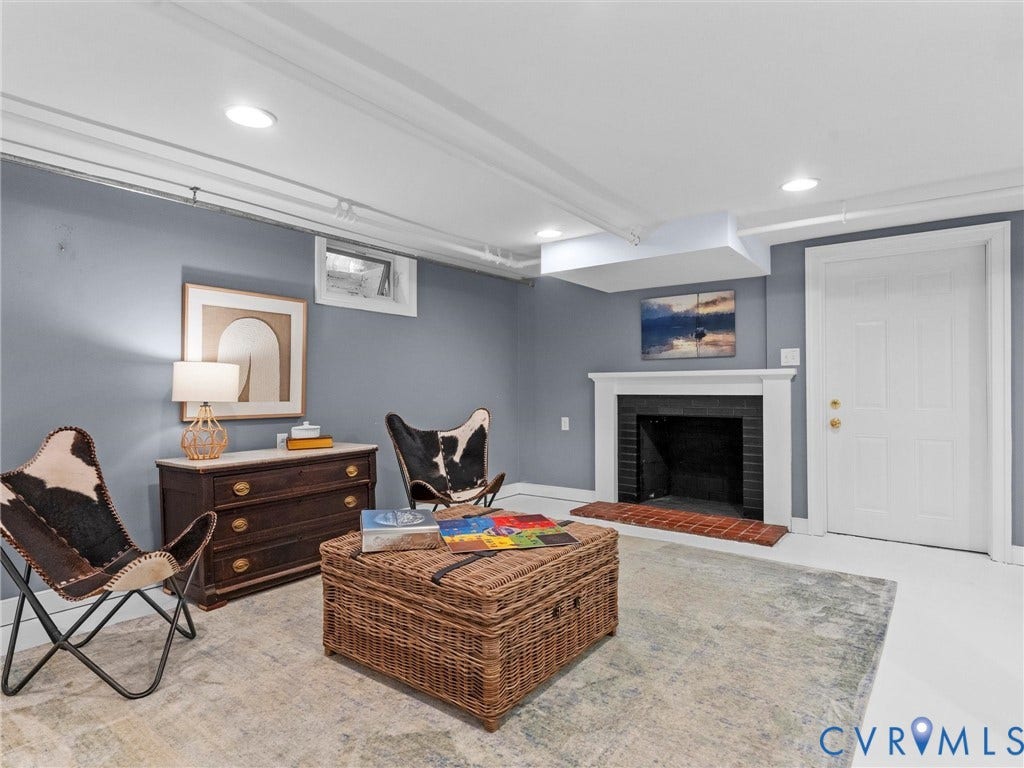 Fireplace with a black masonry surround