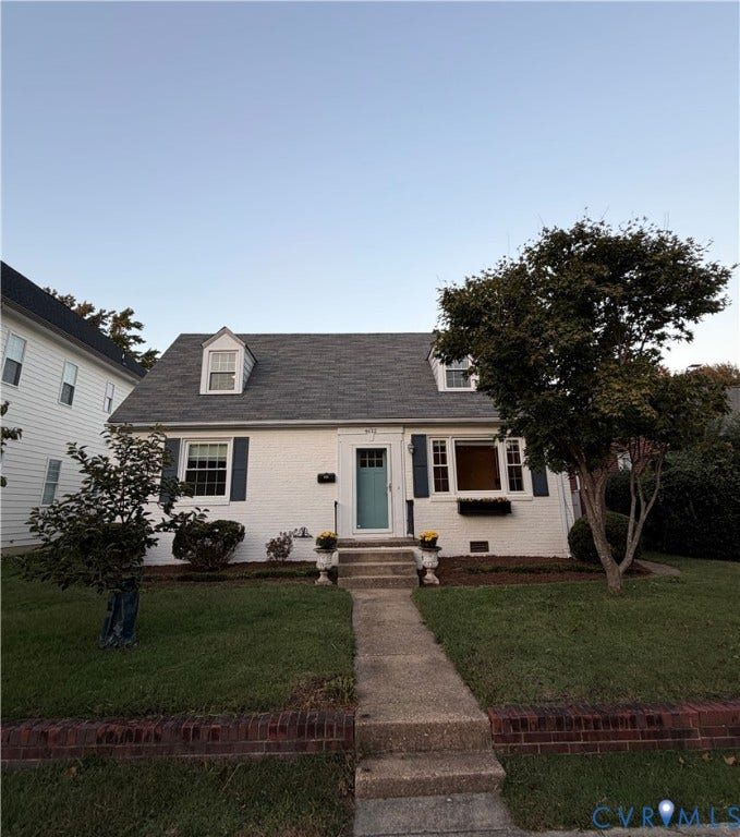 4612 Cutshaw Avenue, Richmond, VA 23230 Cape Cod exterior featuring painted brick siding, dual dormer windows, shuttered multi-pane windows, and a central entryway with concrete steps