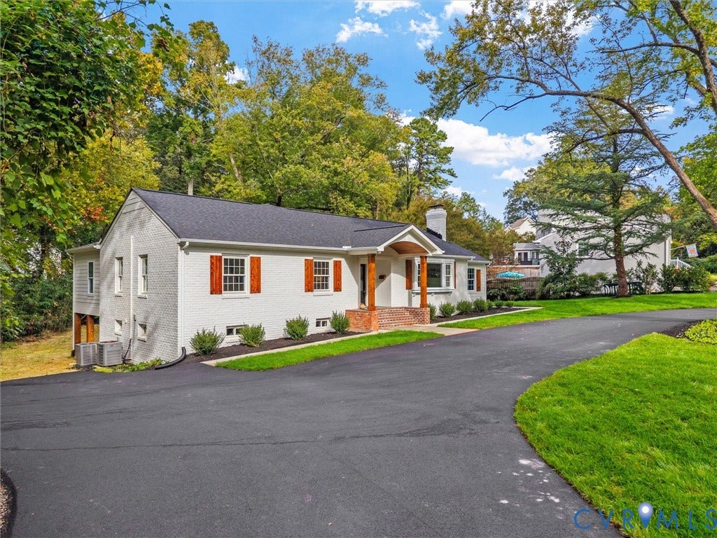 702 Westham Parkway, Westham, Henrico, VA 23229 Ranch-style exterior with painted brick and horizontal siding, featuring a covered porch with brick detailing and wood-finish columns, a dark shingle roof, and decorative window shutters