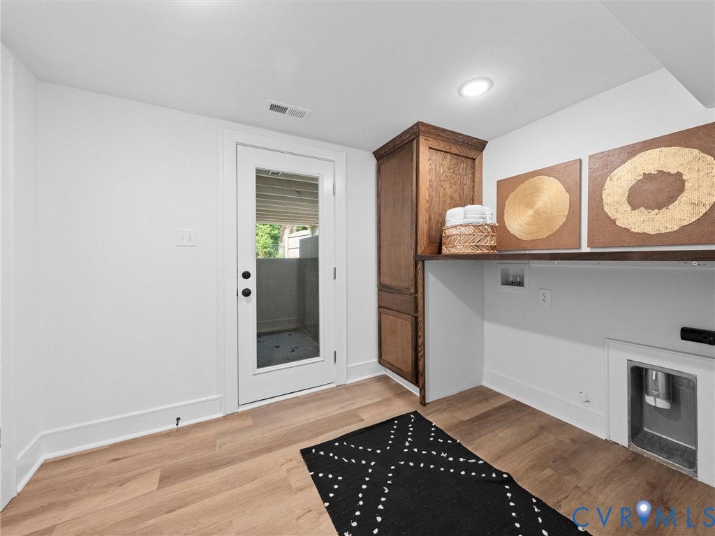 702 Westham Parkway, Westham, Henrico, VA 23229 Wood-finish flooring with a full-light door, recessed lighting, and built-in wood cabinetry
