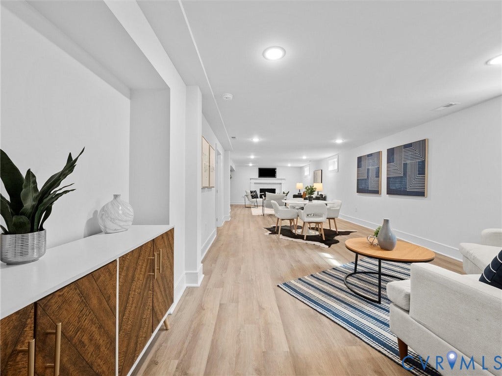 702 Westham Parkway, Westham, Henrico, VA 23229 Recessed lighting illuminates the expansive space featuring light wood-finish flooring