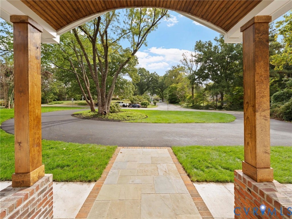 702 Westham Parkway, Westham, Henrico, VA 23229 Paved circular driveway with a central landscaped island and mature trees