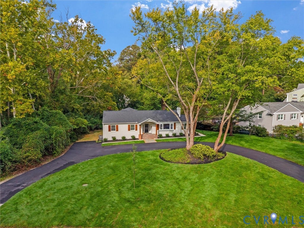 702 Westham Parkway, Westham, Henrico, VA 23229 Lush green lawn with mature trees and a paved driveway