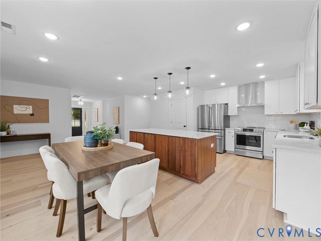702 Westham Parkway, Westham, Henrico, VA 23229 Open-concept living space with light wood-finish flooring, recessed lighting, and a kitchen island with pendant lighting