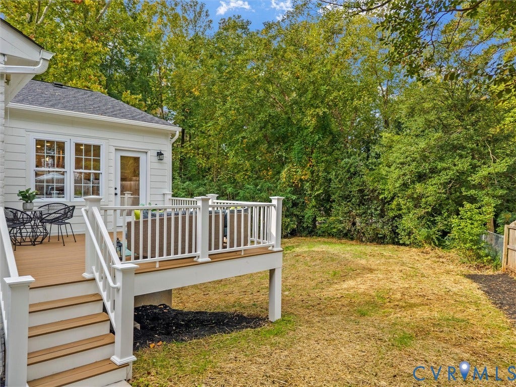 702 Westham Parkway, Westham, Henrico, VA 23229 White siding exterior with a multi-level deck, white railings, and wood-finish decking
