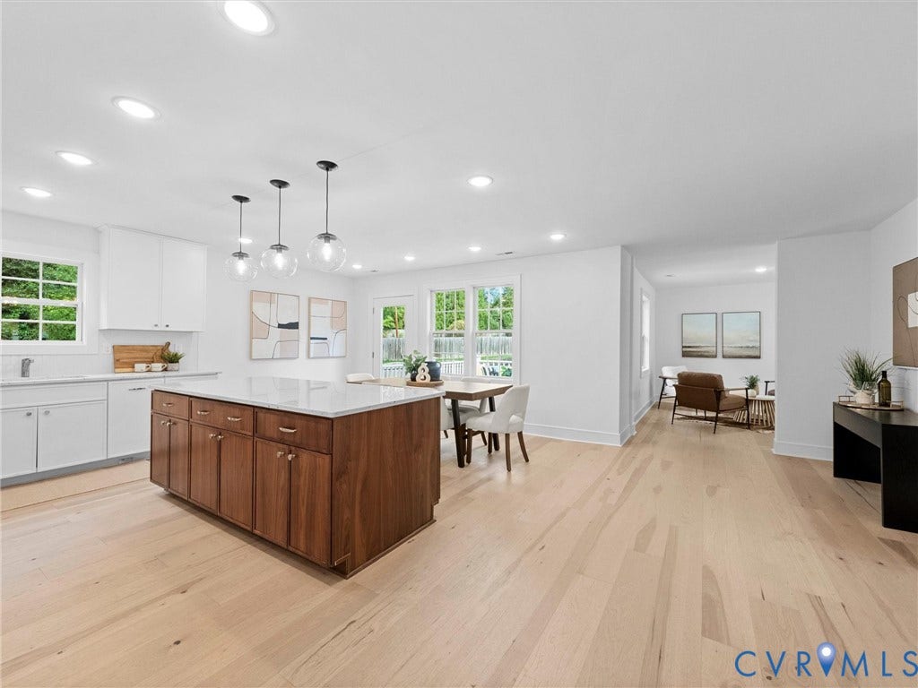 702 Westham Parkway, Westham, Henrico, VA 23229 Expansive open-concept living area featuring light wood-finish flooring, recessed lighting, and a kitchen island with a light-colored countertop