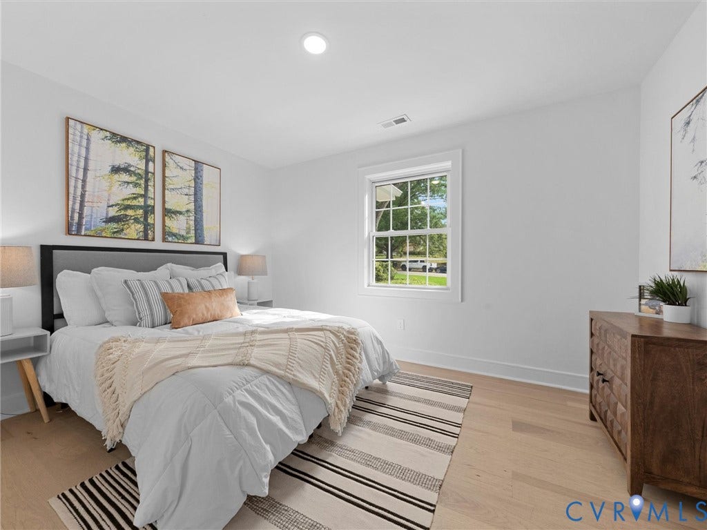 702 Westham Parkway, Westham, Henrico, VA 23229 Recessed ceiling lighting, light wood-finish flooring, white walls, and a multi-pane window
