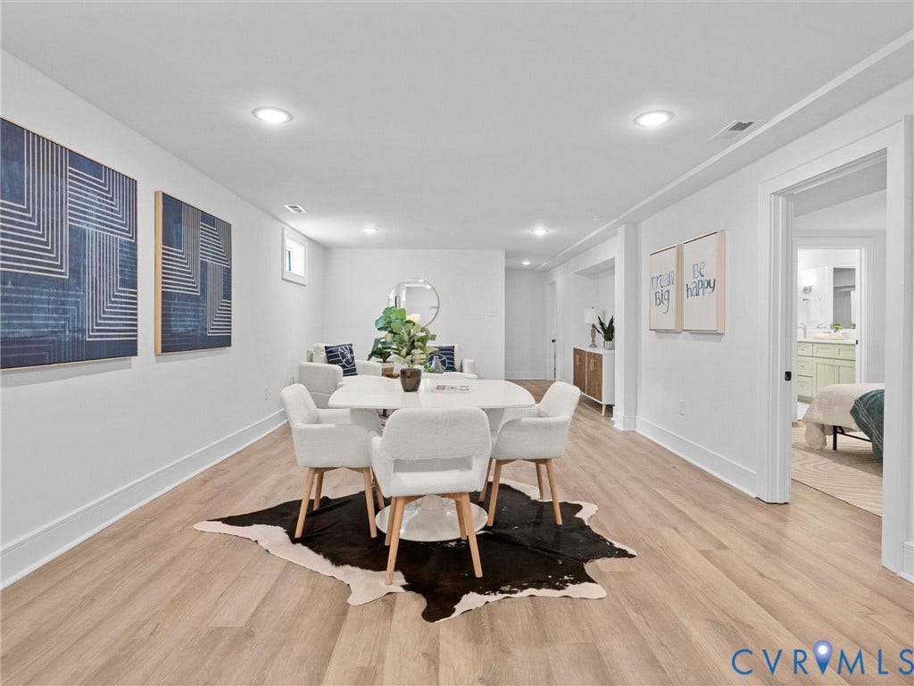 702 Westham Parkway, Westham, Henrico, VA 23229 Recessed lighting illuminates the space, featuring light wood-finish flooring and white walls