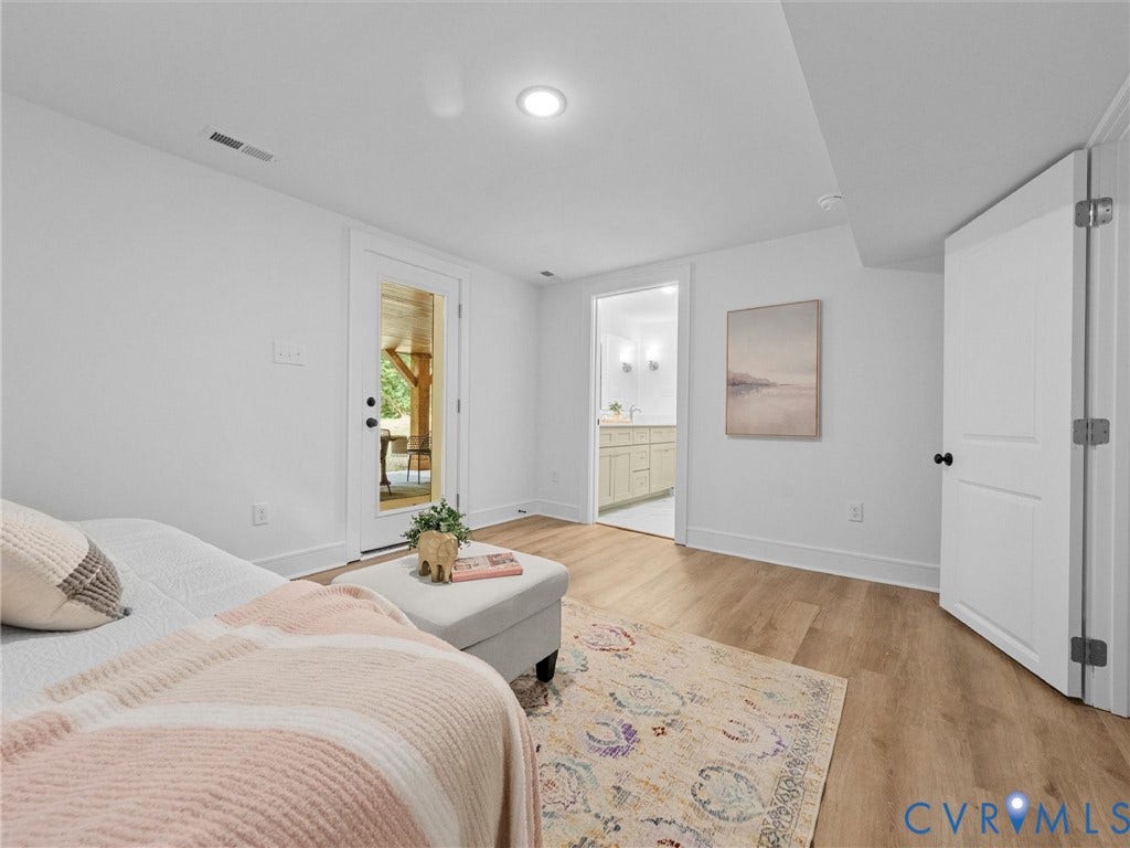 702 Westham Parkway, Westham, Henrico, VA 23229 Recessed lighting illuminates the space with wood-finish flooring