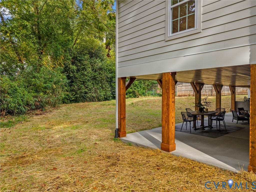 702 Westham Parkway, Westham, Henrico, VA 23229 Expansive outdoor covered patio space featuring concrete flooring, substantial wood support beams, and a wood plank ceiling