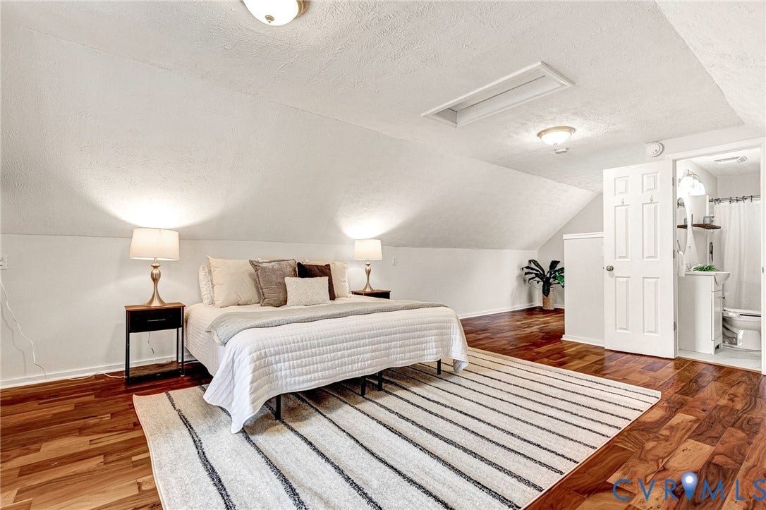 2817 Groveland Avenue, Green Park, Richmond, VA 23222 Wood-finish flooring, white paneled door, and built-in ceiling lighting