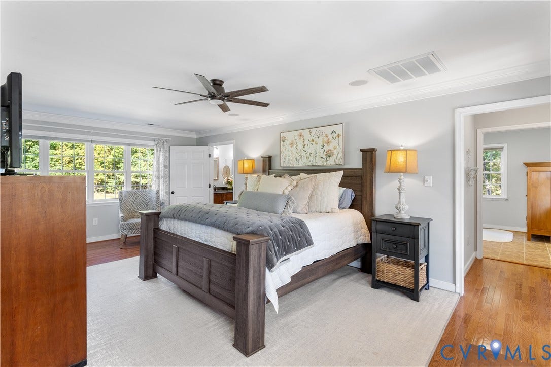 12380 Bienvenue Road, Bowles Acres, Rockville, VA 23146 1st Floor primary featuring wood-finish flooring, lots of great windows, crown molding, adjoining laundry room