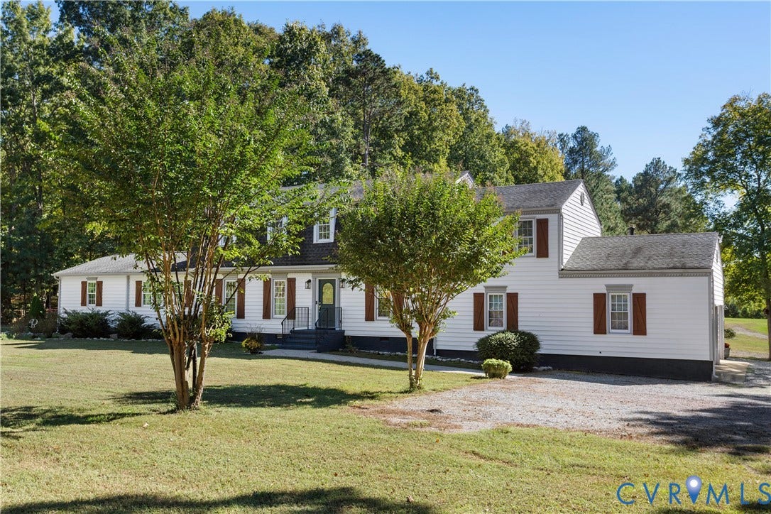 12380 Bienvenue Road, Bowles Acres, Rockville, VA 23146 Two-story residence featuring a gravel driveway, and an expansive lawn