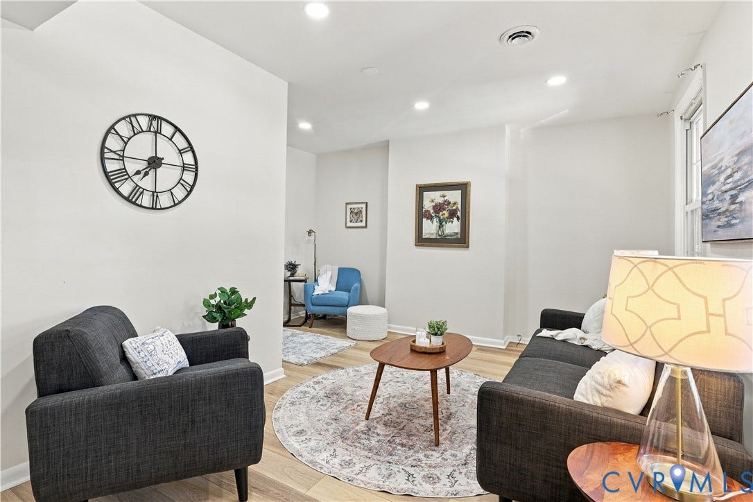 Interior space featuring wood-finish flooring and recessed lighting