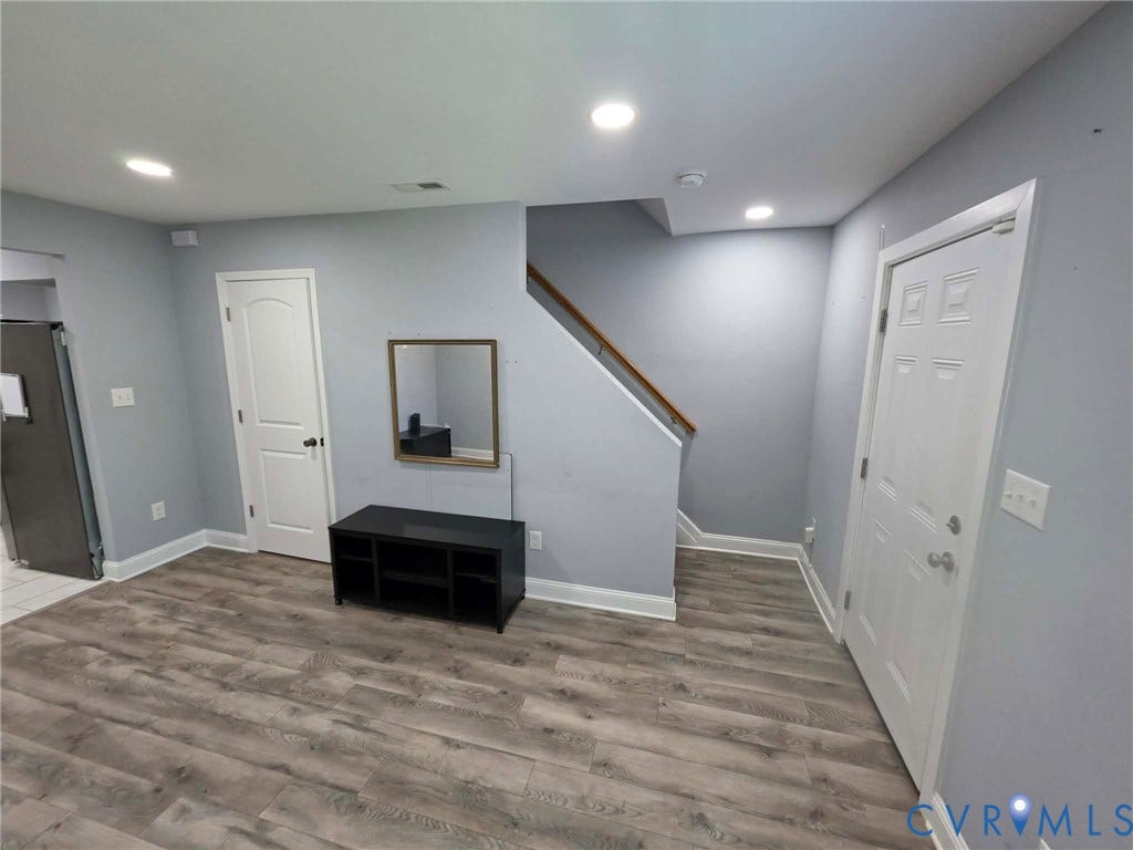 1351 Minefee Street, Bellemeade, Richmond, VA 23224 Living room featuring LVP flooring, recessed, lighting, and an open concept feel.