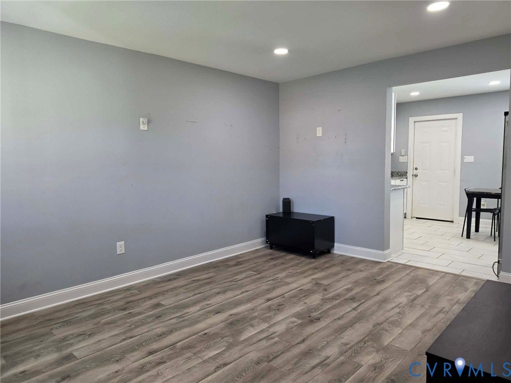1351 Minefee Street, Bellemeade, Richmond, VA 23224 Living room featuring LVP flooring, recessed, lighting, and an open concept feel.