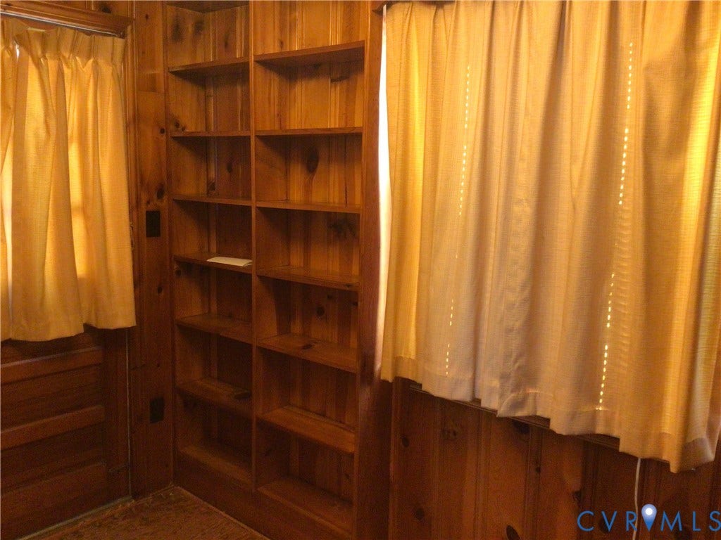 1307 Greystone Avenue, Richmond, VA 23224 This could be an office, den, or library. With lovely tongue and grove wood siding and built in shelves