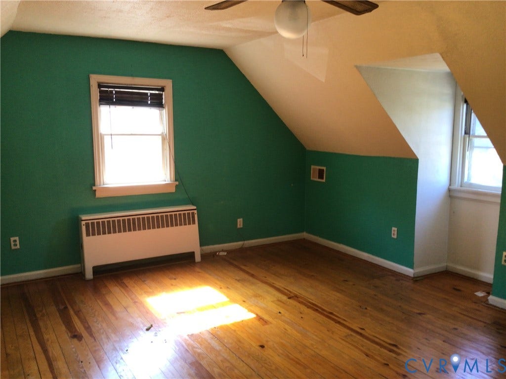 1307 Greystone Avenue, Richmond, VA 23224 Hardwood flooring, with dormer window, and a ceiling-mounted light fixture