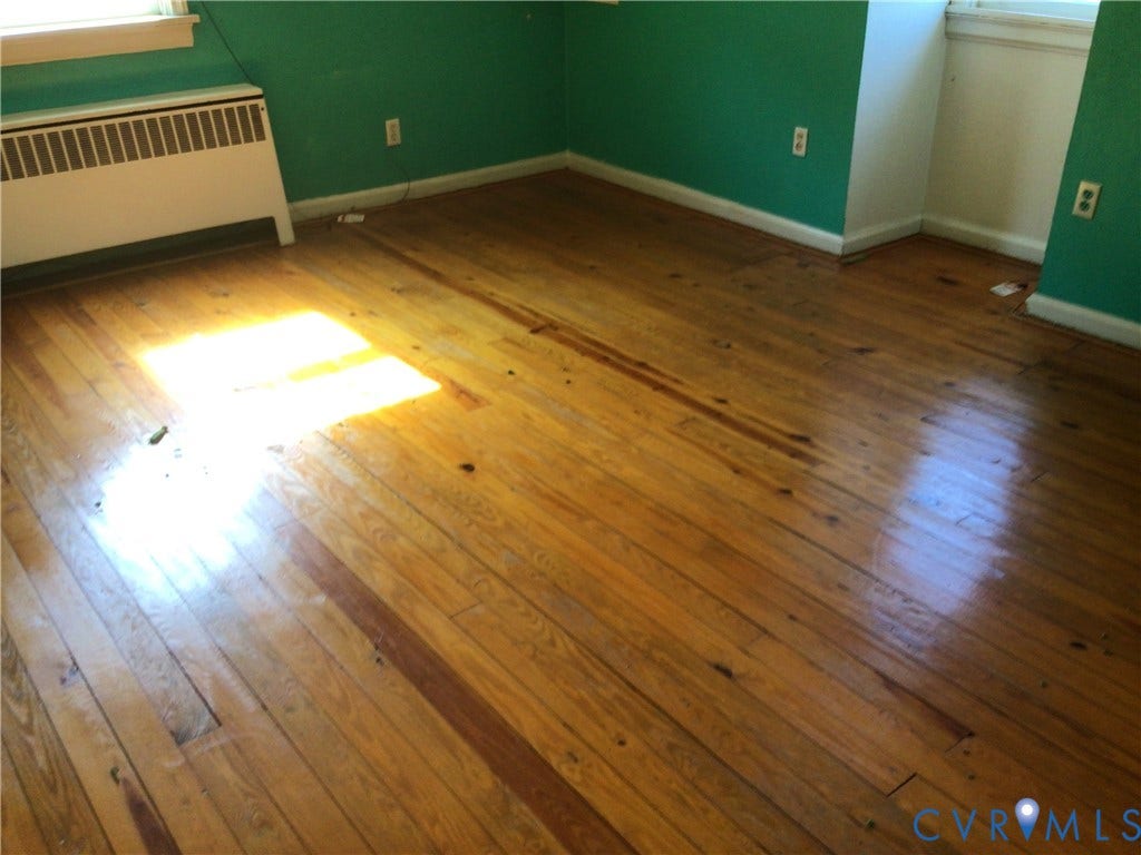 1307 Greystone Avenue, Richmond, VA 23224 Interior space featuring hardwood flooring and white-painted window trim