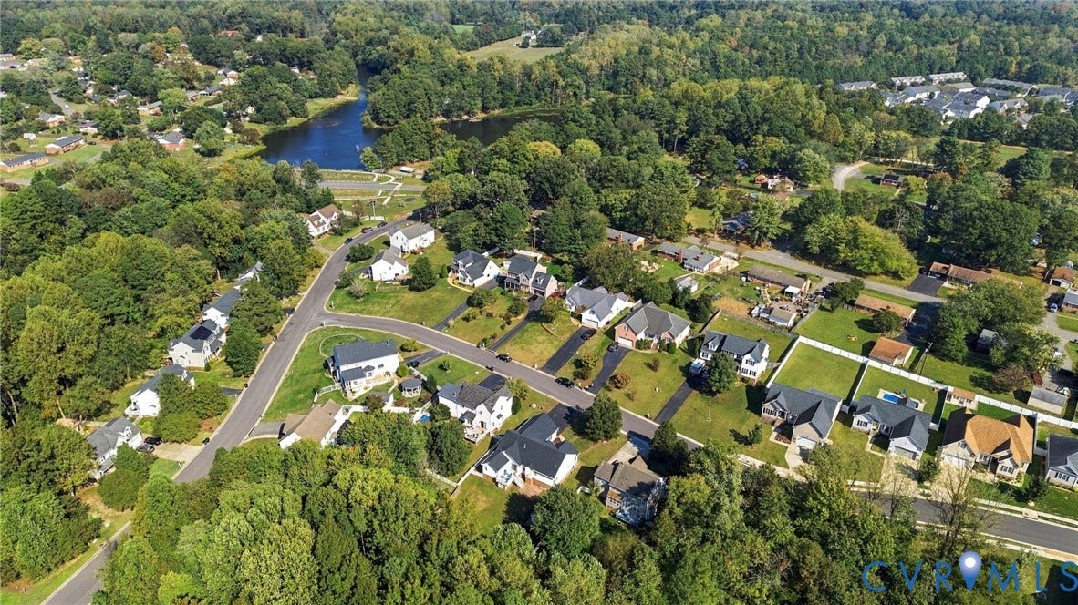 8119 Castle Grove Drive, Mechanicsville, VA 23111 Aerial view featuring established residential lots, mature tree canopy, and proximity to a local water feature